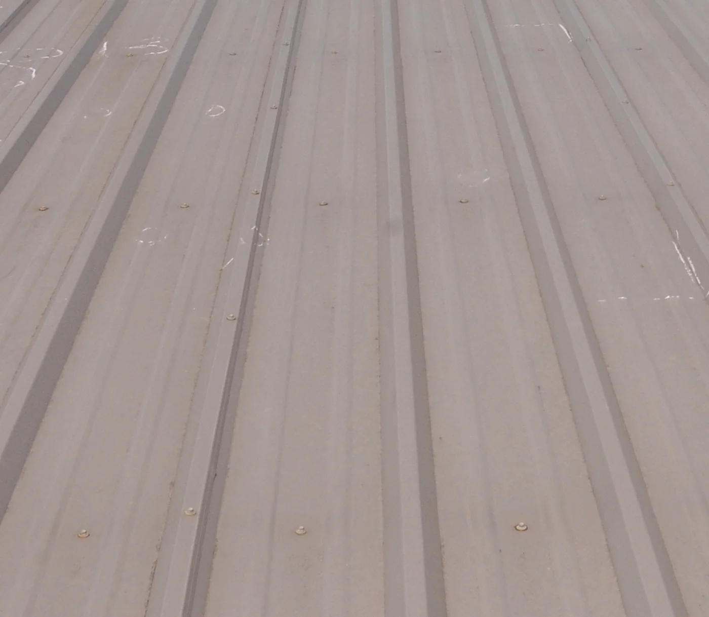 Chalk-marked metal roof after hail in Moore, Oklahoma, May 2010 (FEMA / Win Henderson). Illustrative hail damage — not a property we inspected in this city and not a client file.