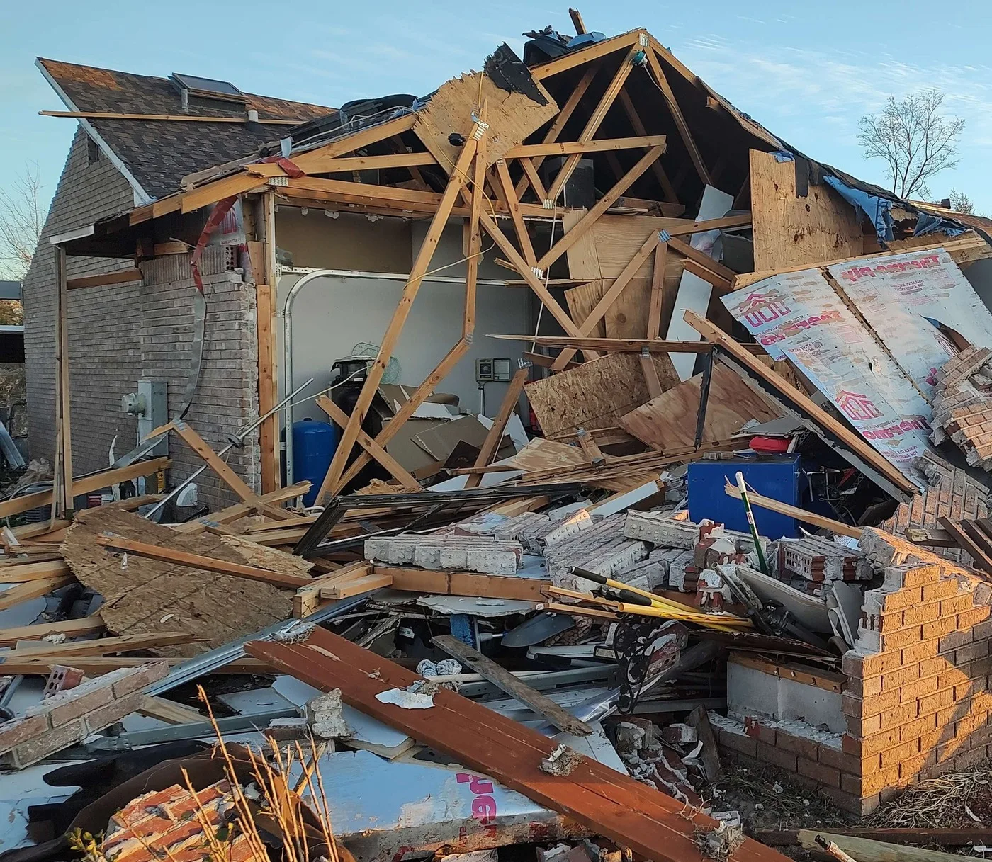 Storm-damaged property illustrating losses we document for Aurora claims