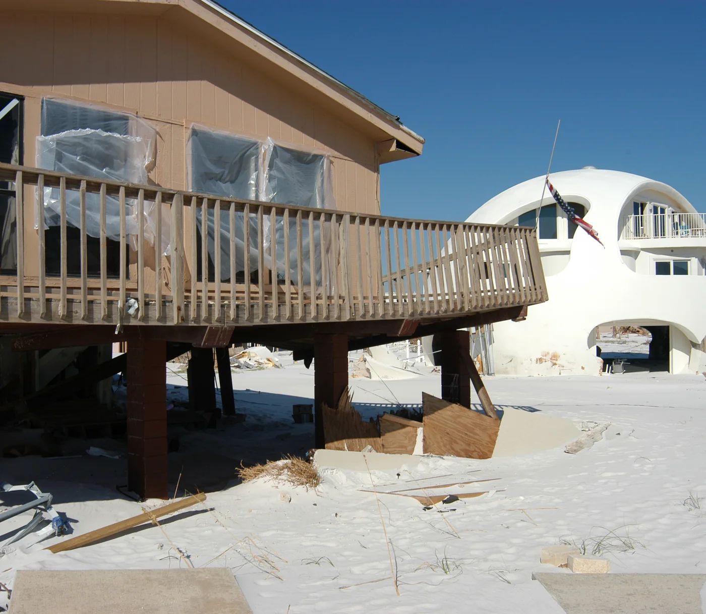 Illustrative Florida coastal homes with storm-surge damage, including a distinctive dome house — FEMA Photo Library; not a client file