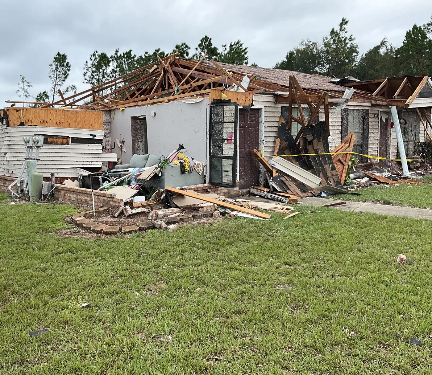 Storm-damaged property illustrating losses we document for Centennial claims