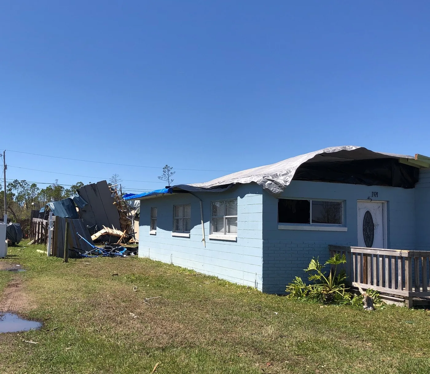 Storm-damaged property illustrating losses we document for Doral claims