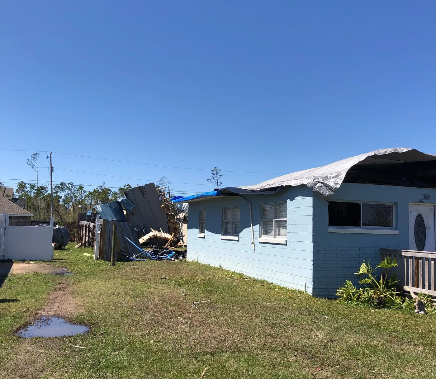 Storm-damaged home illustrating losses we document for Duluth claims