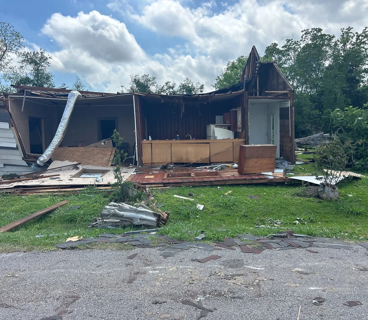 Storm-damaged home illustrating losses we document for Everett claims