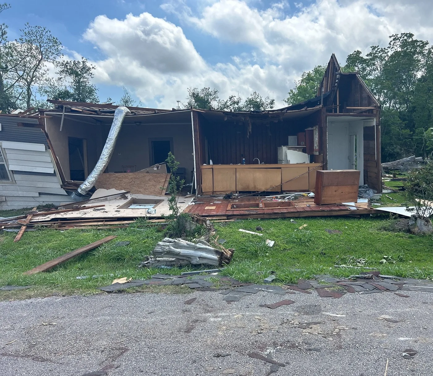 Storm-damaged home illustrating losses we document for Farmington claims