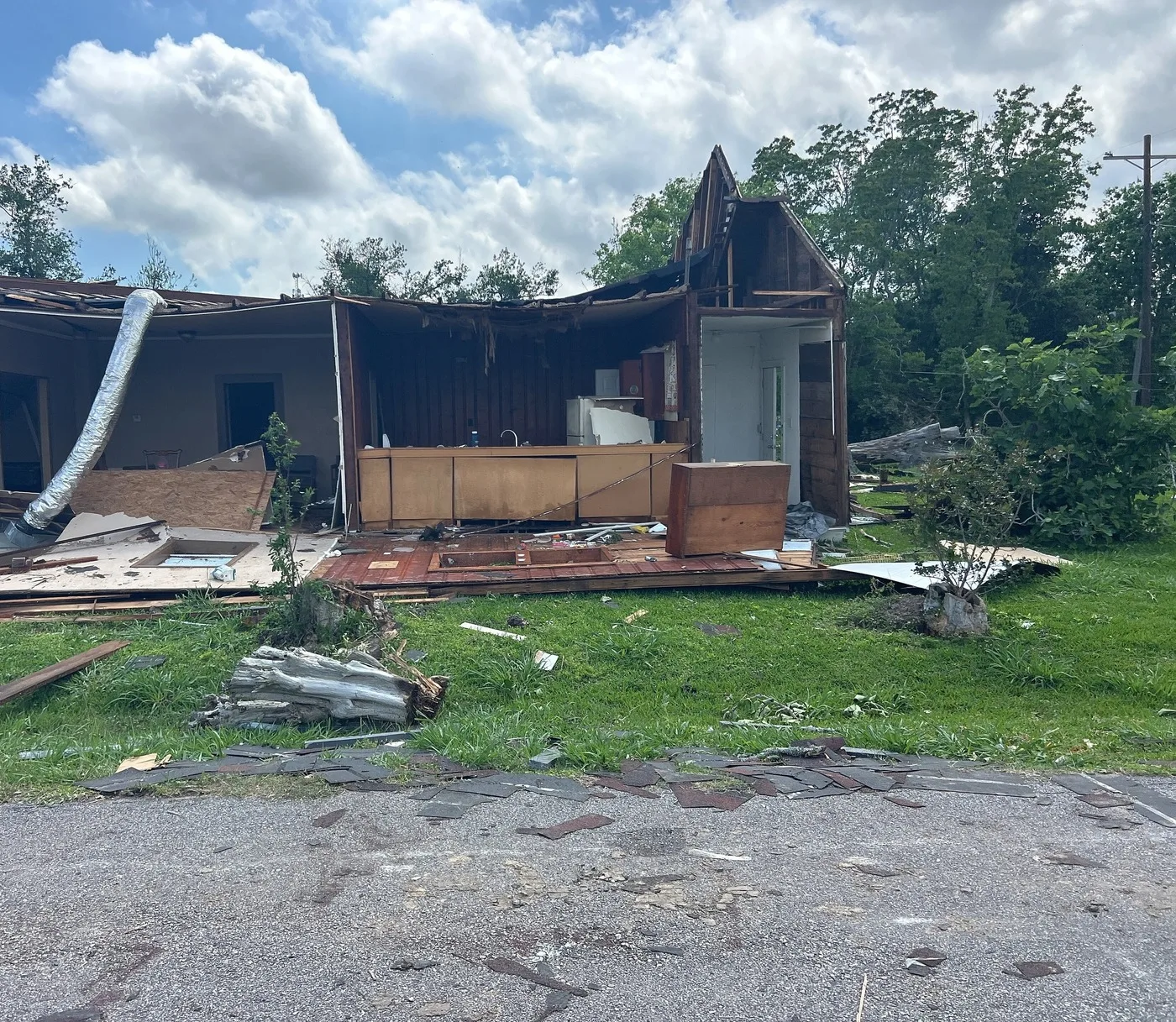 Storm-damaged home illustrating losses we document for Fayetteville claims