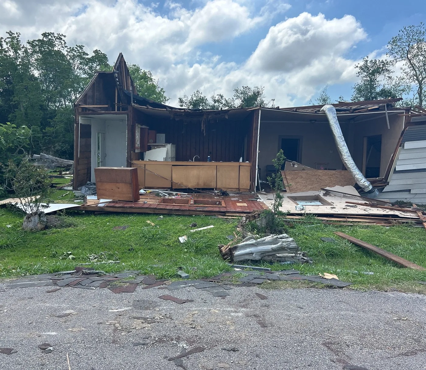 Storm-damaged property illustrating losses we document for Frisco claims