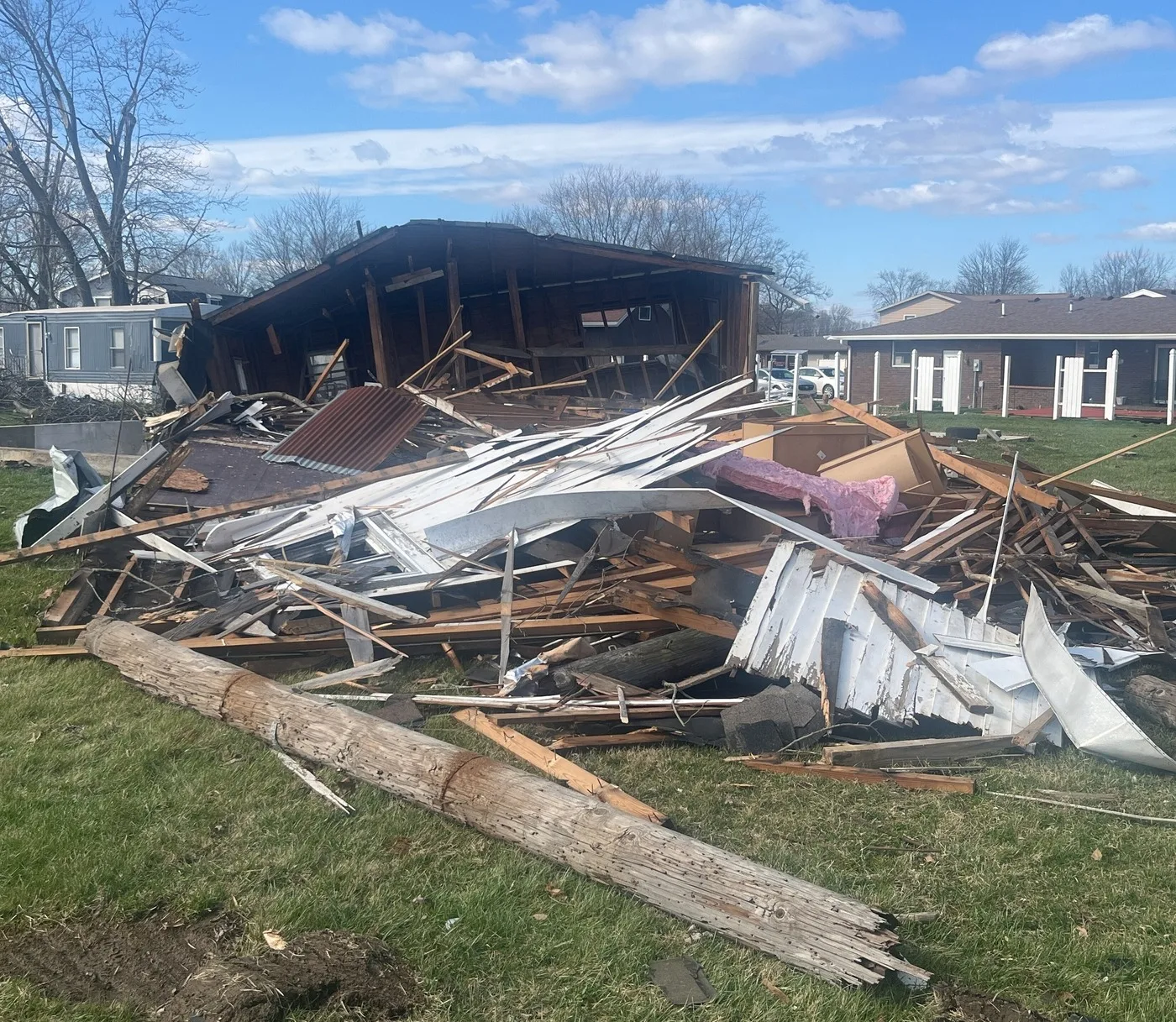 Storm-damaged property illustrating losses we document for Garland claims