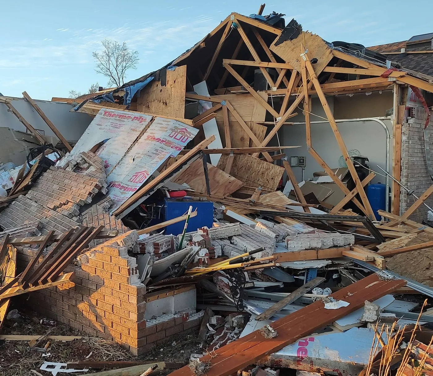 Storm-damaged home illustrating losses we document for Golden claims