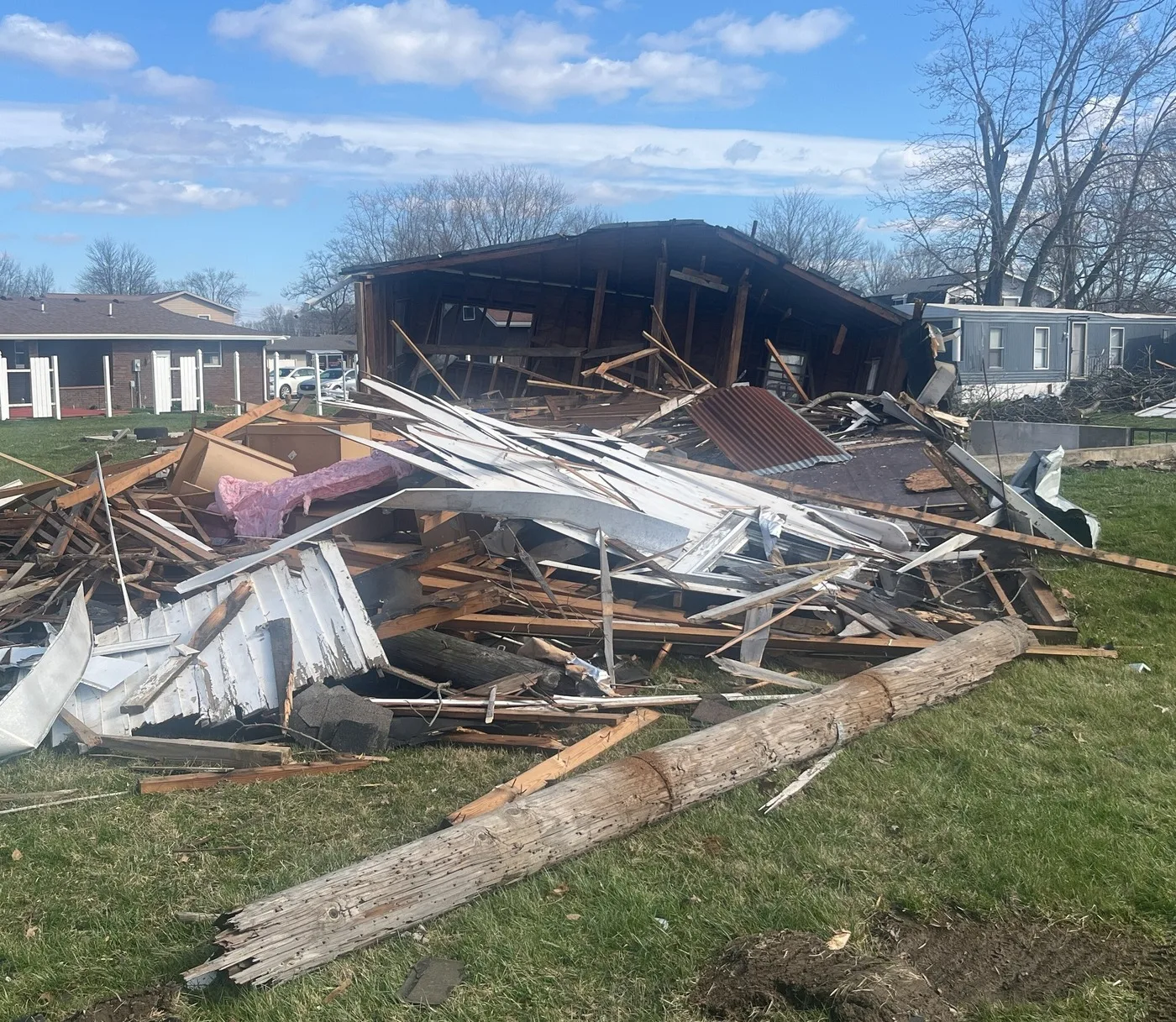 Storm-damaged home illustrating losses we document for Greenville claims