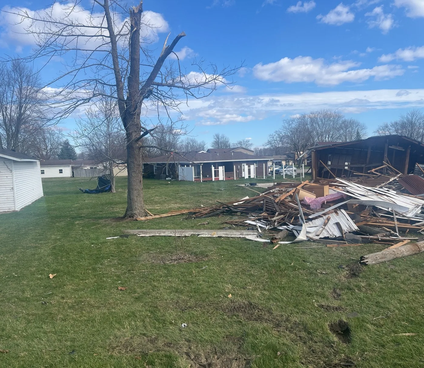Storm-damaged property illustrating losses we document for Homestead claims