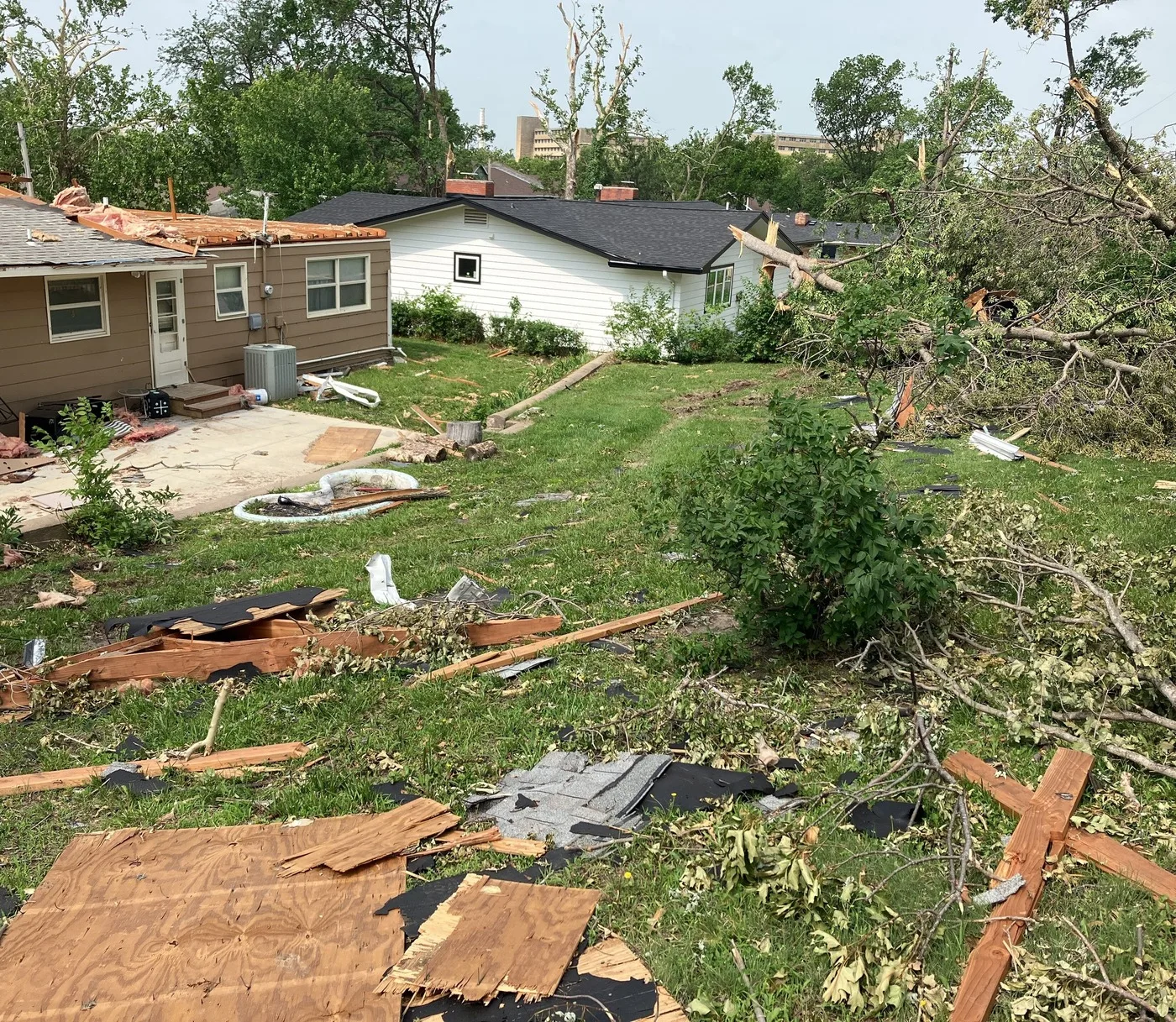 Storm-damaged home illustrating losses we document for Johns Creek claims
