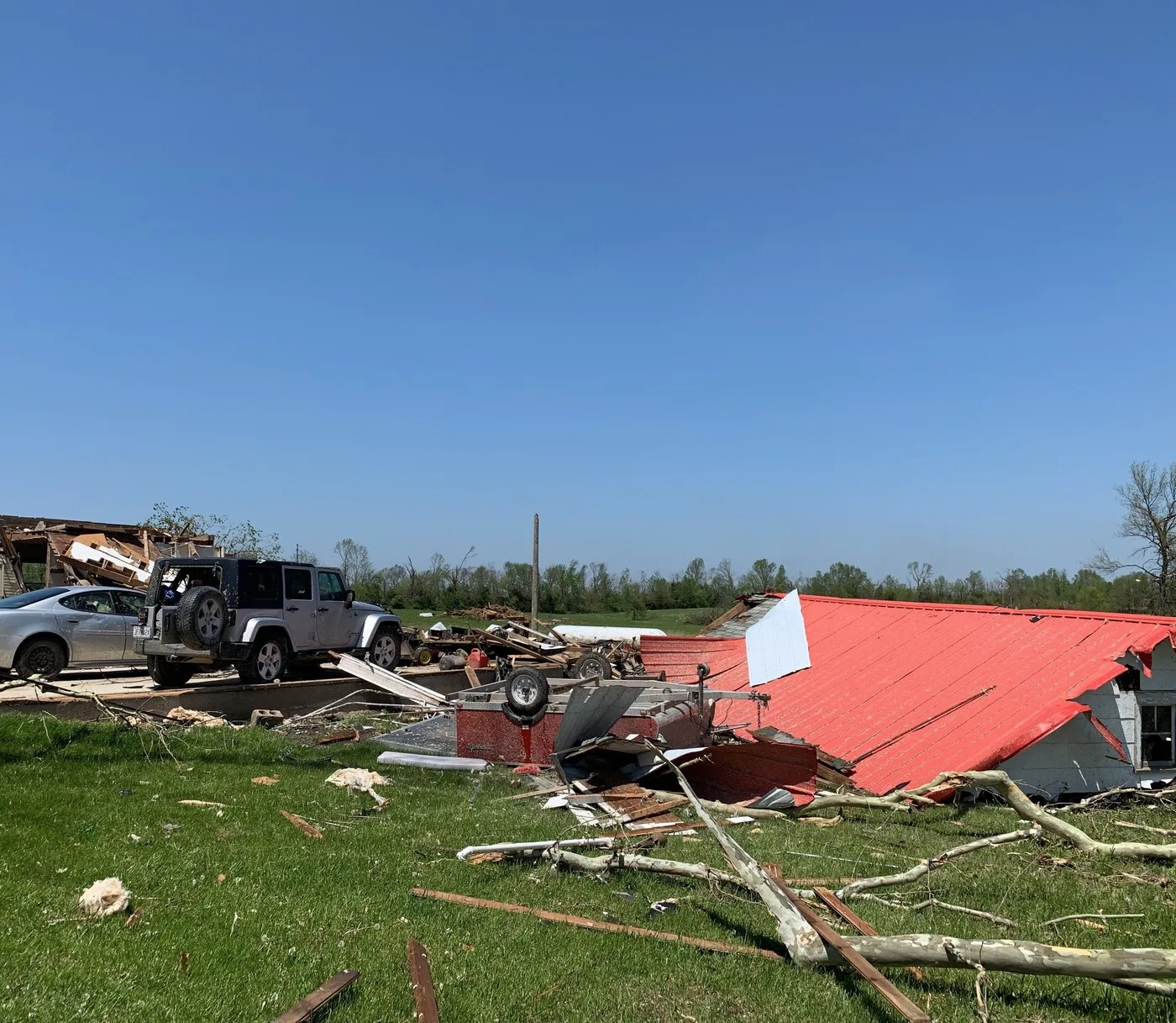 Storm-damaged property illustrating losses we document for Loveland claims