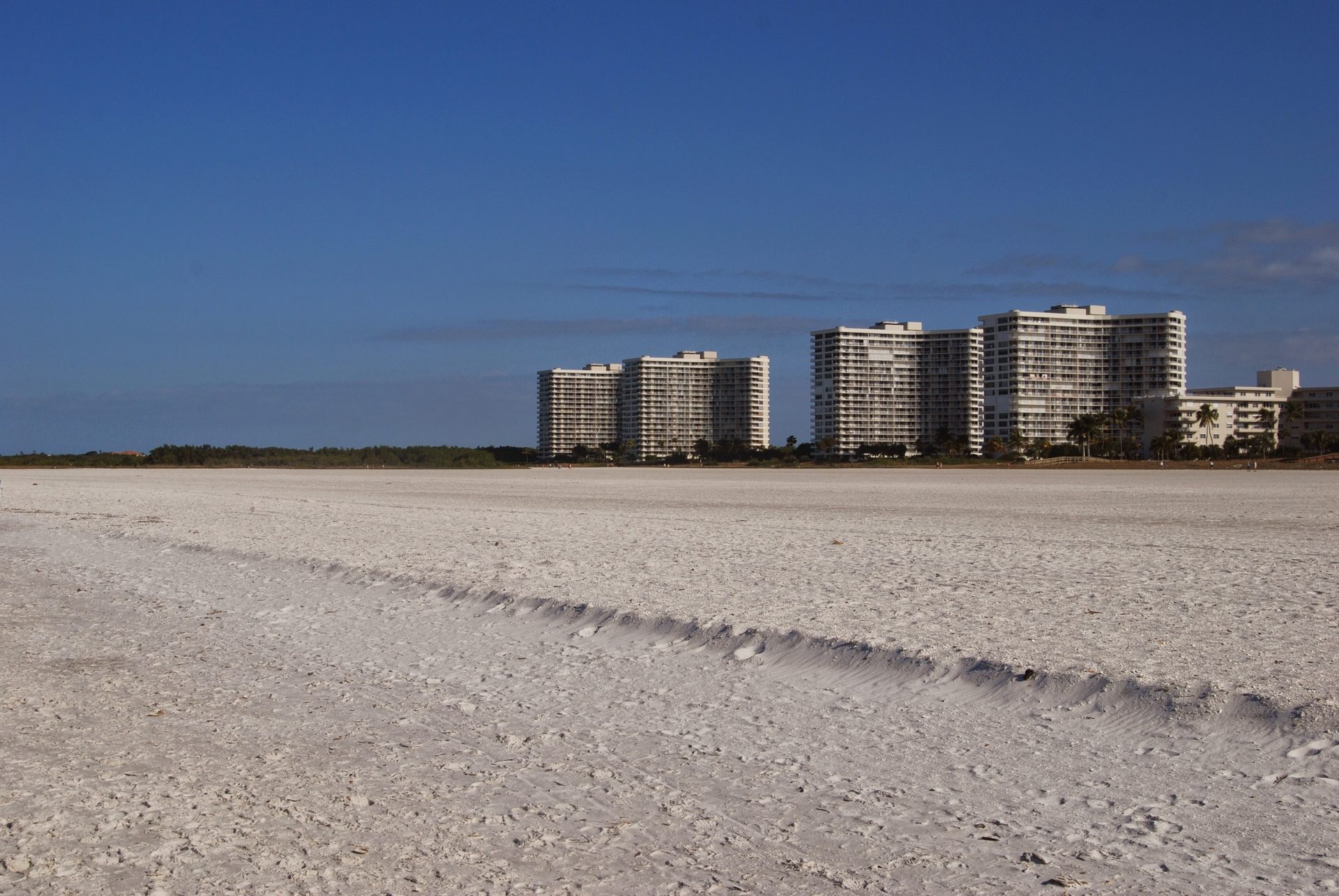 Marco Island beach with condominium towers along the Gulf shore