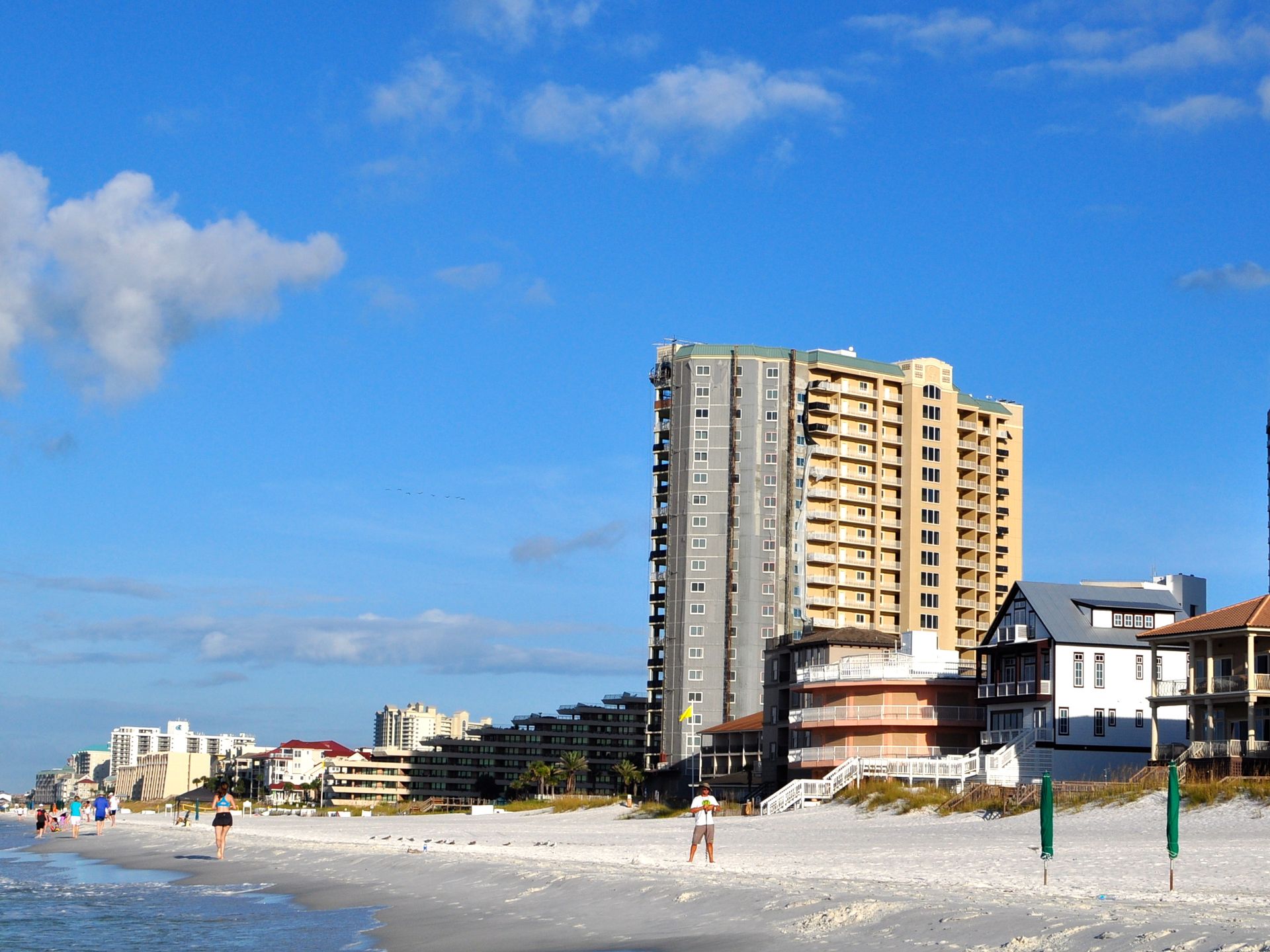 Gulf beach with condominium towers in Miramar Beach, Florida