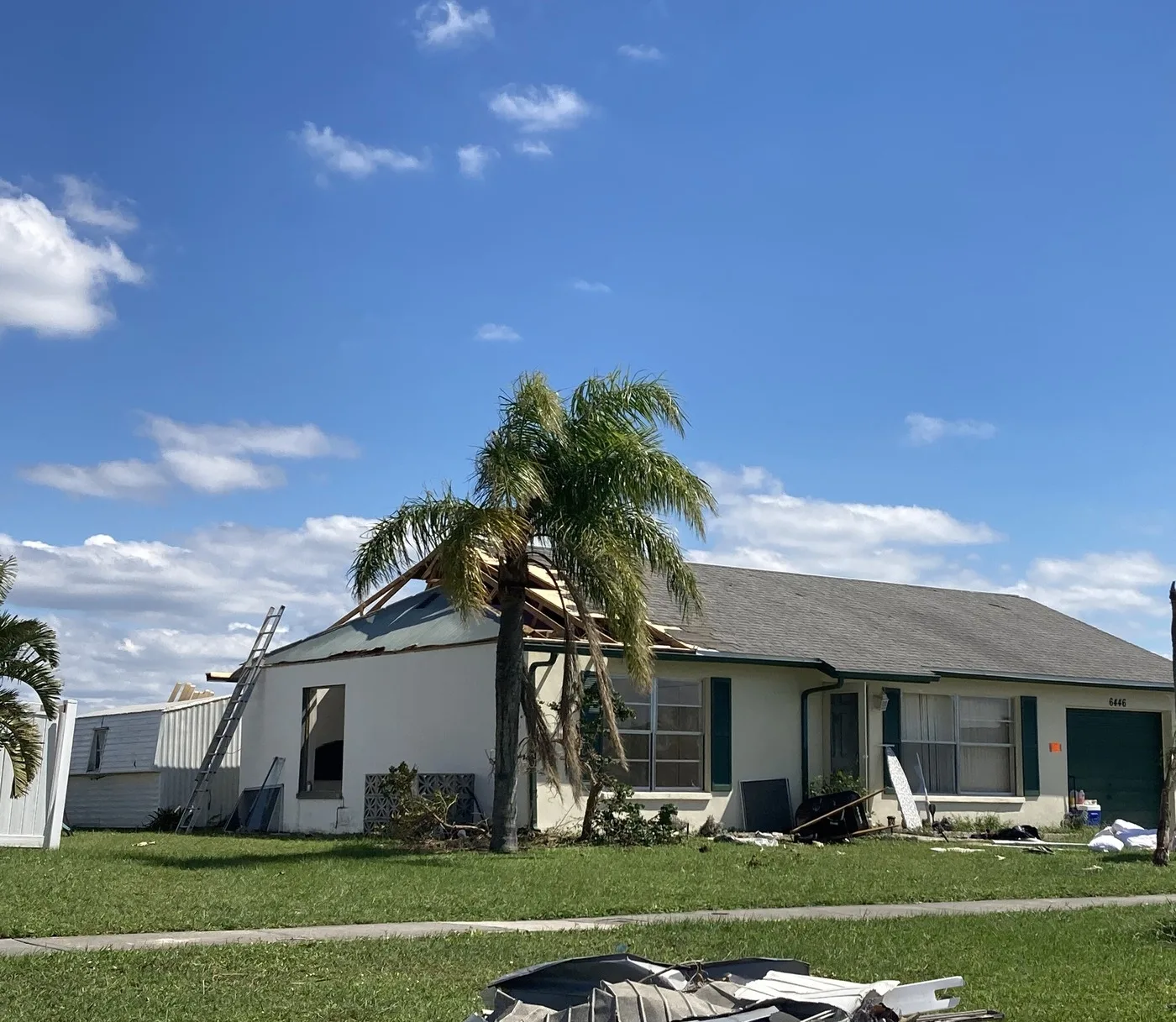 Storm-damaged home illustrating losses we document for Roswell claims