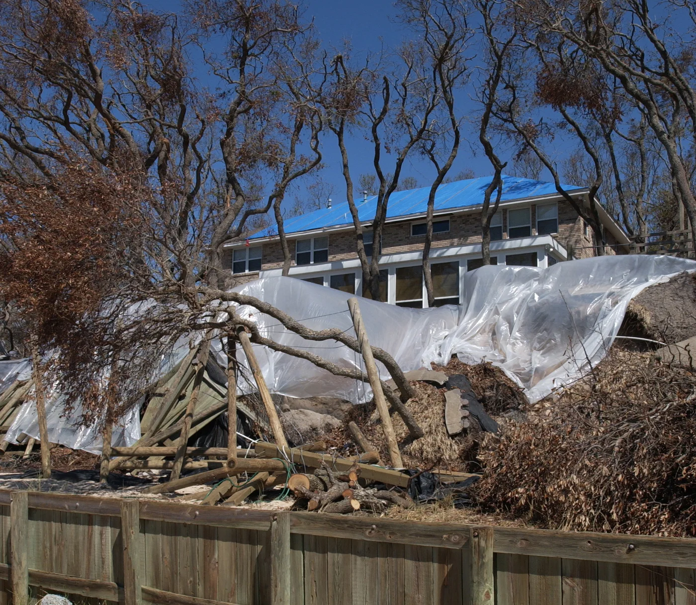 Storm-damaged home illustrating losses we document for Whitefish claims